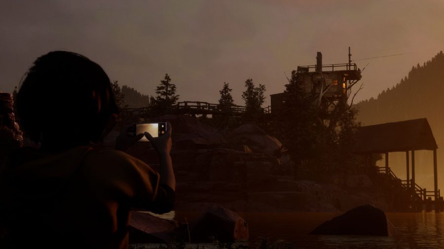 The Quarry Preview Until Dawn Sequel: Kaitlyn can be seen taking a picture of a overlook tower.