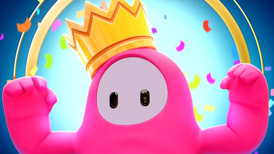 Fall Guys proximity chat: A pink bean shows off their guns while wearing the crown