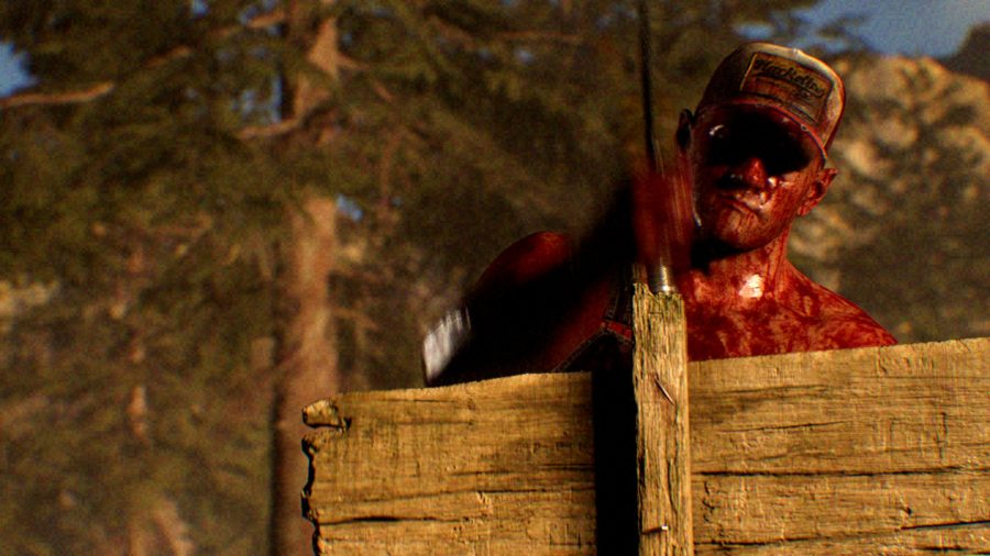 The Quarry Review: A blood covered man hammering in a wooden sign in the forest