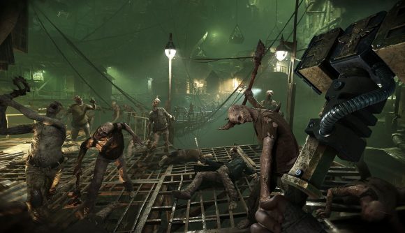 Warhammer Darktide Gameplay Trailer: a person can be seen holding a melee weapon with zombies all around