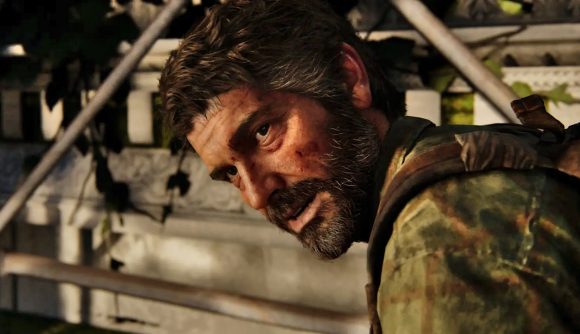 The Last of Us remake workbenches: Joel sits with his head bowed