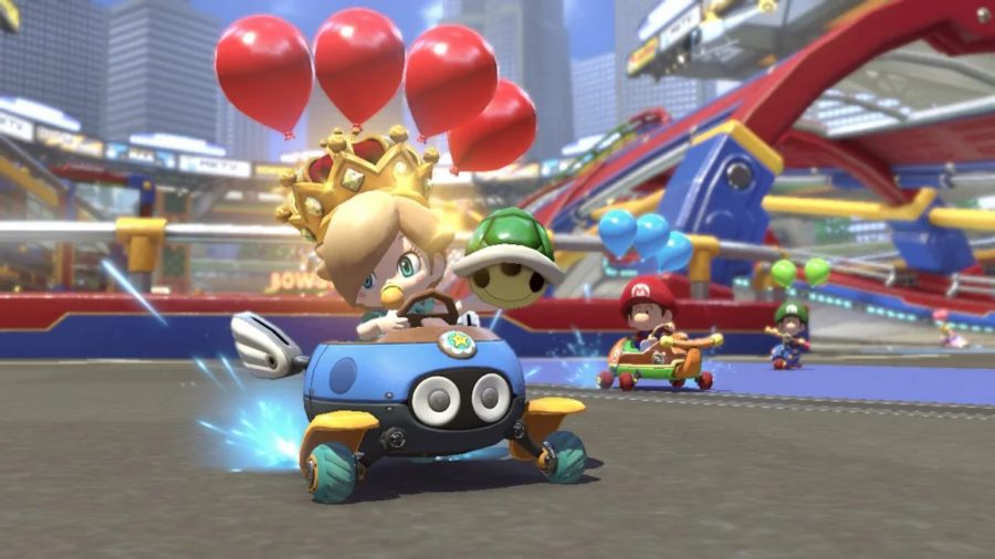 Mario Kart 8 Deluxe characters: Baby Peach takes on a corner with three balloons attached to her kart