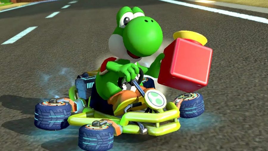 Mario Kart 8 Deluxe characters:  Yoshi prepares a boom box